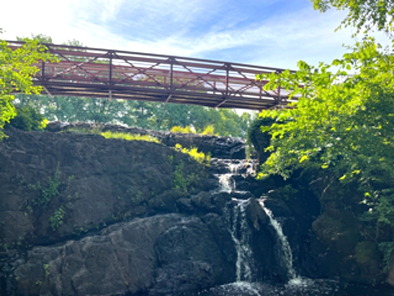 Mill Pond Falls and footbridge in Newington Connecticut